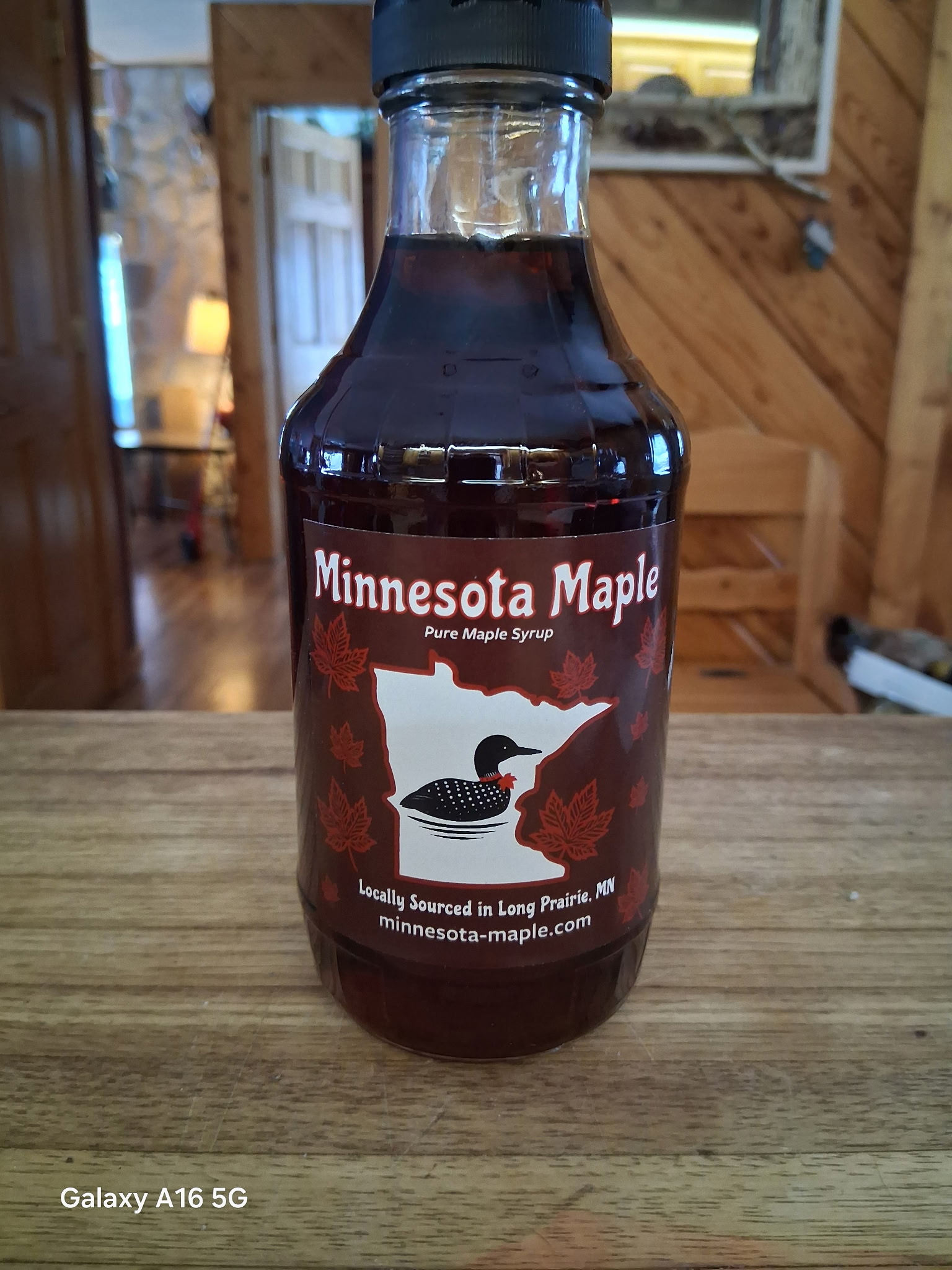 Minnesota Maple pure maple syrup bottle with minnesota-maple.com on the label